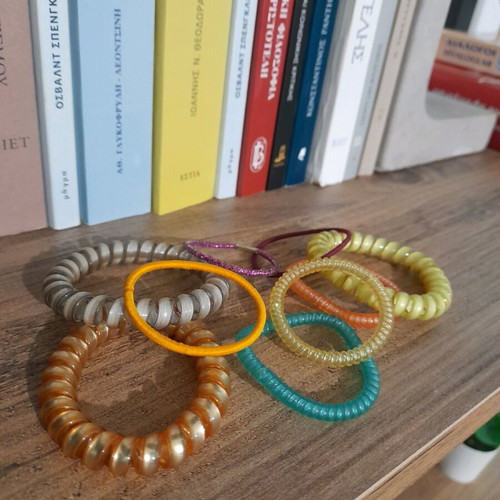 Hair ties used, colorful, all together