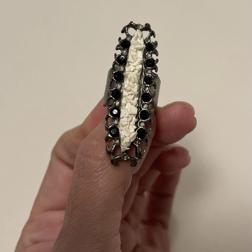 Set of 7 rings used with adjustable clasp