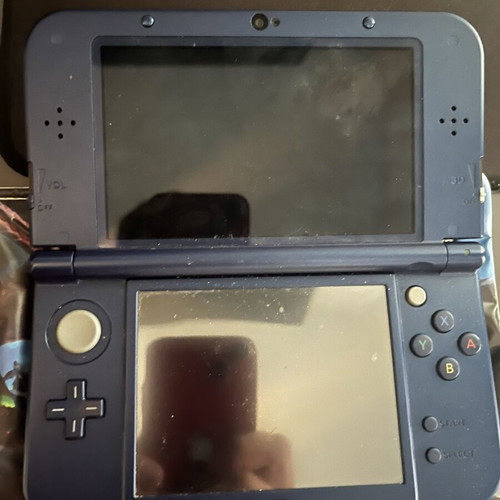 Nintendo 3DS New XL console with charger and Monster Hunters case