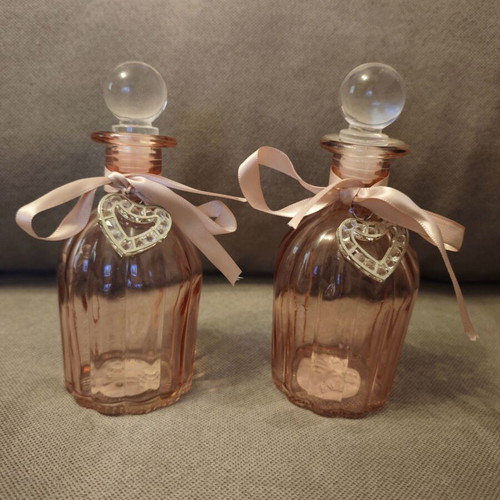 Decorative pink bottles like new, set of two