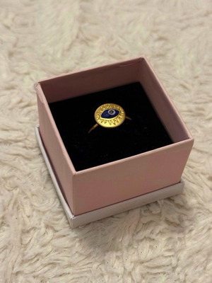 Stainless steel ring with gold-tone evil eye like new