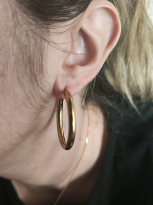 Medium-sized hoop earrings like new, gold stainless steel
