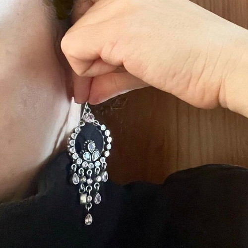 Silver chandelier earrings used with pink semi-precious stones