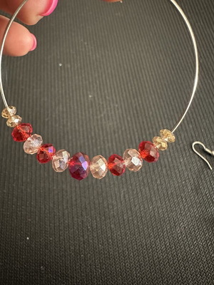 Large silver hoop earrings with red and pink crystal beads, like new