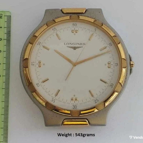 Longines Conquest table clock used with wooden base