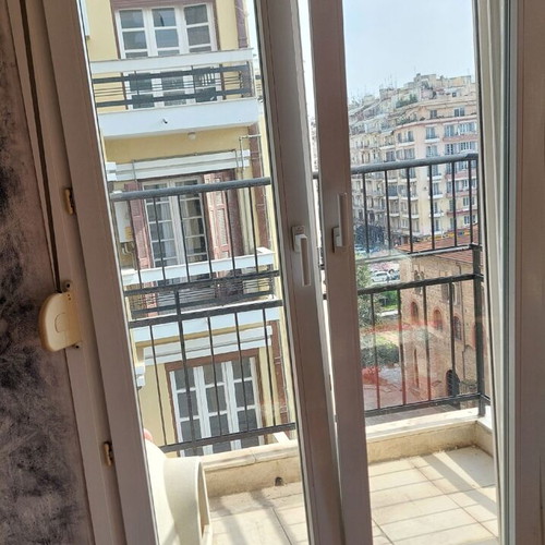 Glass double door like new, tinted, white frame, premium construction