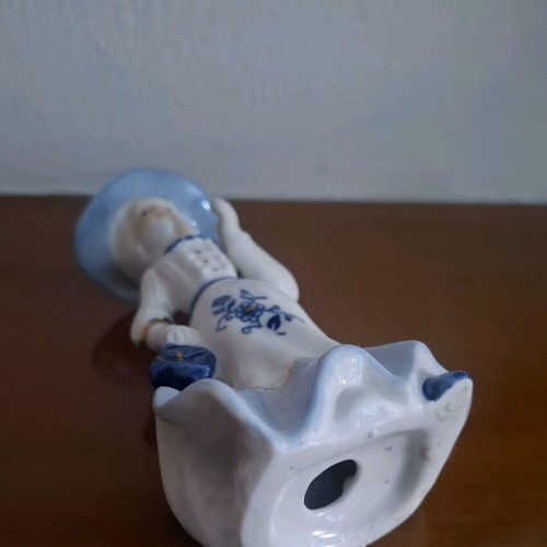 Retro porcelain woman figurine with gold details like new