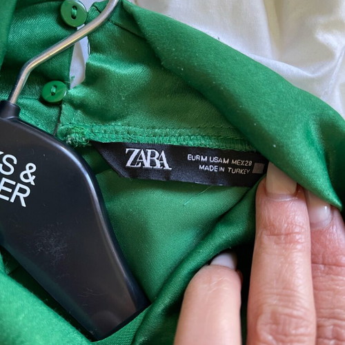 Green blouse size M like new with gathers and draped neckline