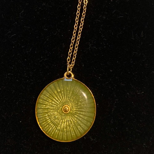 Necklace used, green-gold steel shield pendant