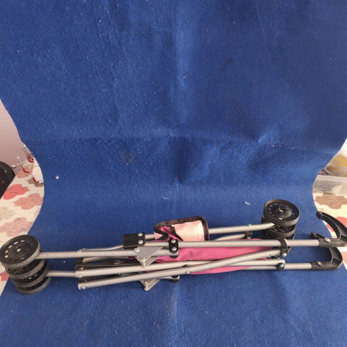 Toy stroller like new, lightweight and foldable