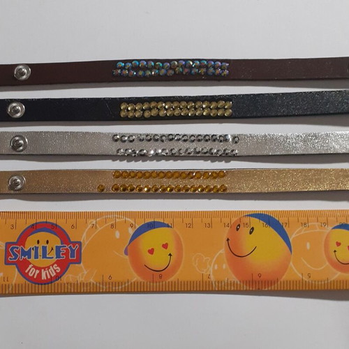 Pack of 235 denim and faux leather bracelets with rhinestones