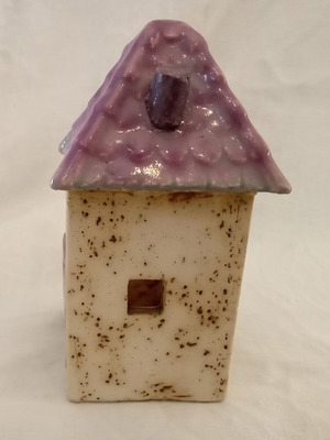 Handmade ceramic candle holder "ROZOS" used