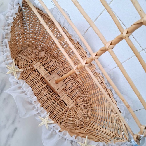 Large wicker basket in sailboat design used