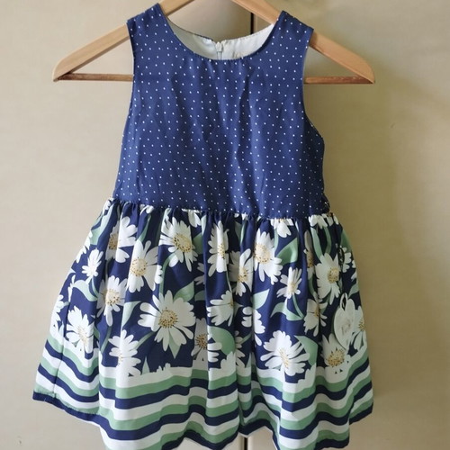 Moonstar dress for 6-year-old girl with daisy and polka dot design