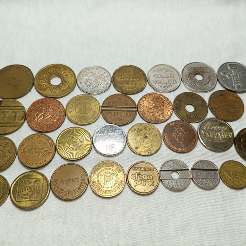 Tokens used, 30 old foreign brands for parking and car wash