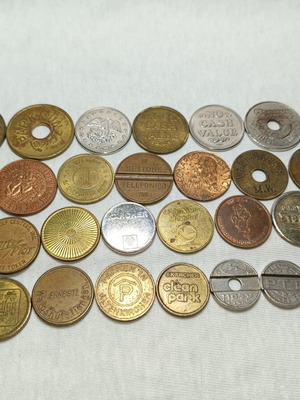 Tokens used, 30 old foreign brands for parking and car wash