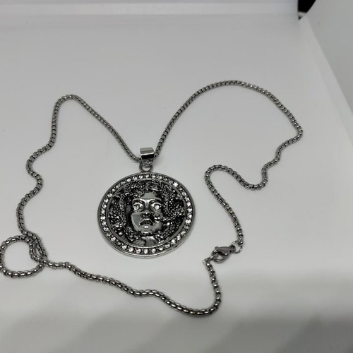 Medusa Pendant in Steel like new with rhinestones and chain