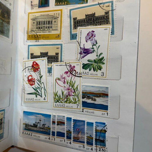 International Stamp Collection album with large vintage Greek and foreign stamps lot