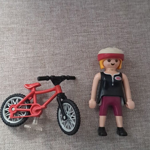 Playmobil woman with bicycle figure