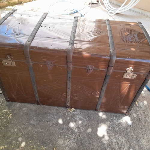 Large antique chest used with iron and wood design