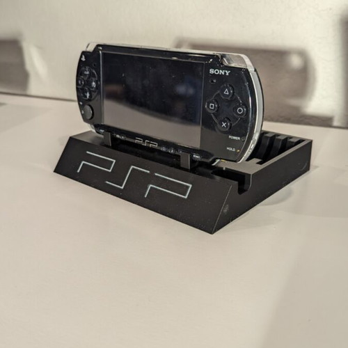 Sony PSP stand for console and discs like new