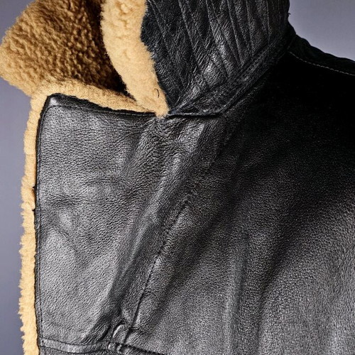 Men's mouton parka like new, black with beige fur lining