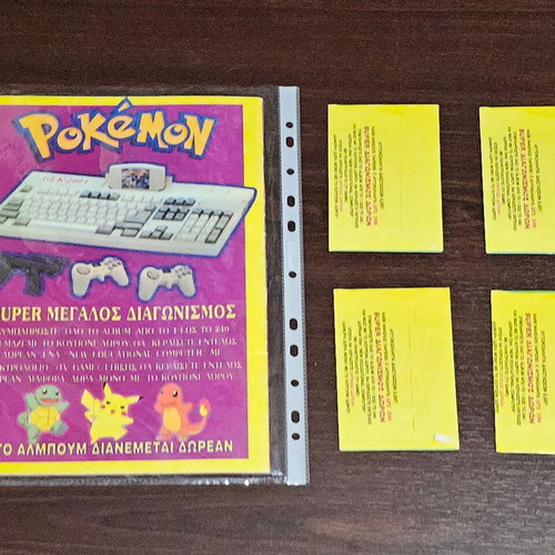 Pokemon album new with four sealed packs