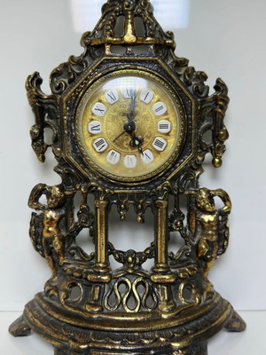 Vintage brass table clock baroque style used