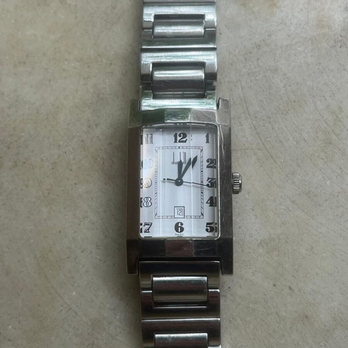 Dunhill Swiss Made QW-712 Rectangular Premium Series watch like new, white dial