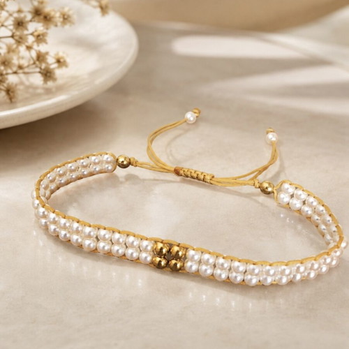 Woven bracelet with white pearls and gold hematite