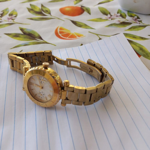 Guess women's watch, gold tone
