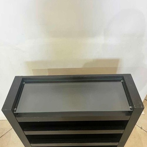 Wooden furniture with glass surface and two shelves on wheels used