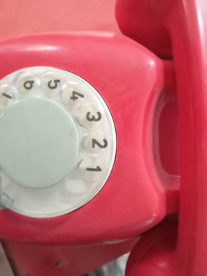 Classic telephone used, red, corded