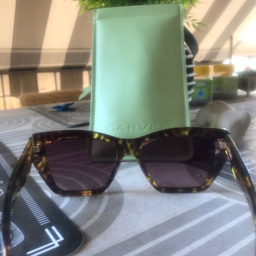 Carven tortoise sunglasses used, with case