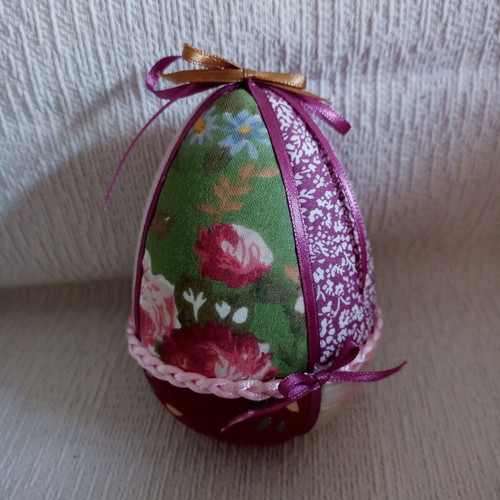 Decorative egg green and purple floral used