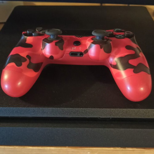 PS4 Slim 1TB console with 1 controller and 3 games