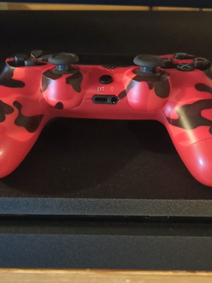 PS4 Slim 1TB console with 1 controller and 3 games