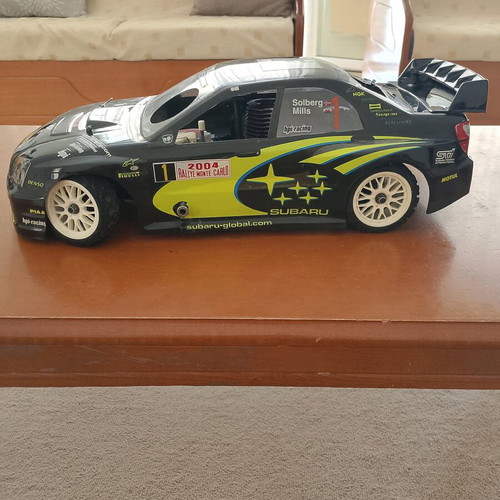 Gas-powered remote control Subaru racing car like new