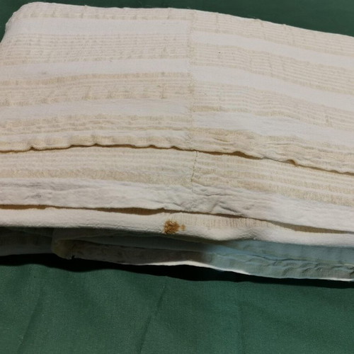 Wool woven bed sheet used, 1930s era with wear and stain