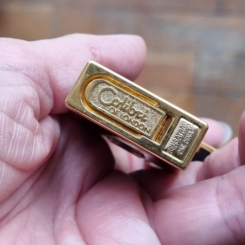 Colibri Touch Sensor Lighter used, black and gold
