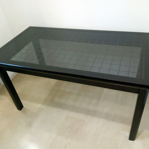 Black modern dining table like new, solid wood with smoked glass top