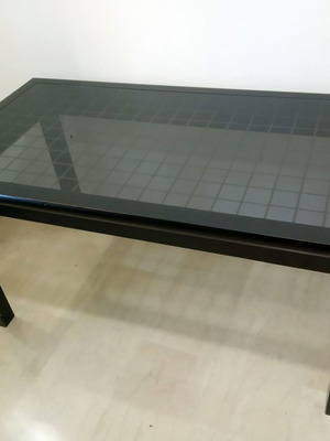 Black modern dining table like new, solid wood with smoked glass top