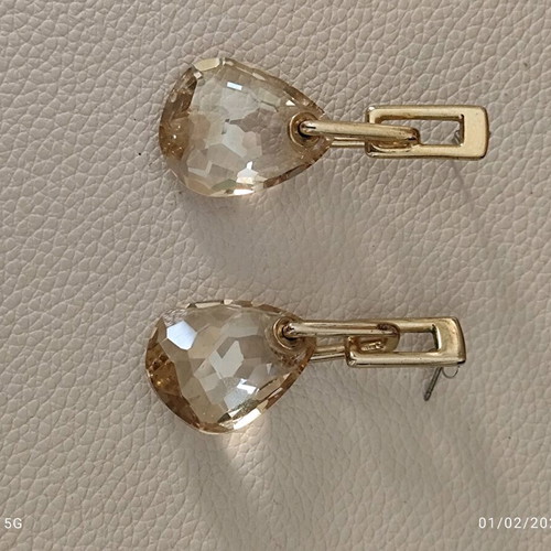 Swarovski earrings with honey crystal drop, like new