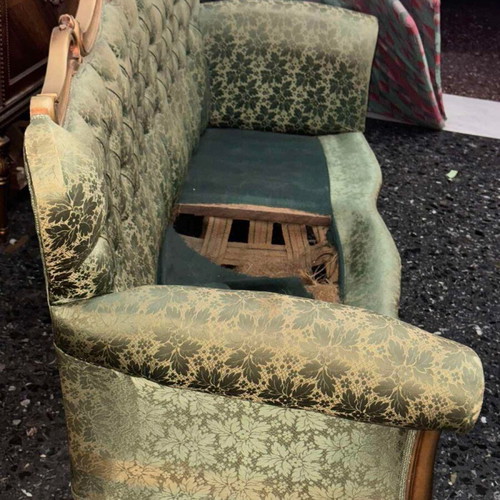 Loui vintage sofa from the 60s used with green floral fabric