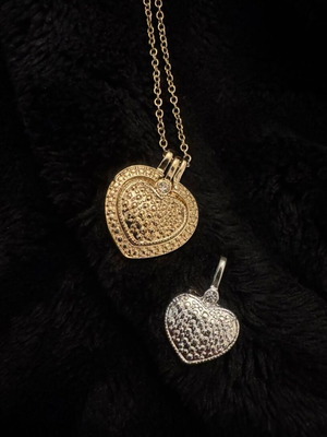 Vintage steel necklace with motif like new, silver and gold colors