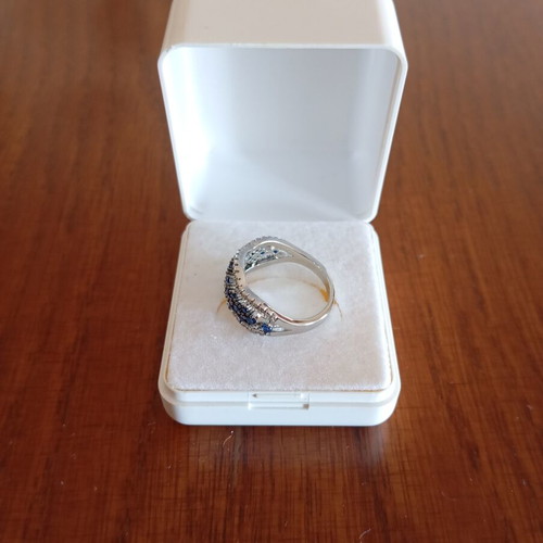 Ring with blue and silver zircon stones, new, size 7
