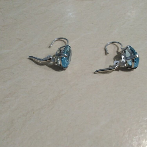 Earrings pair with turquoise stones like new, collectible