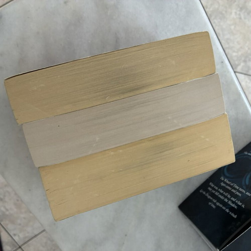 The Wheel of Time books used, first six by Robert Jordan, English