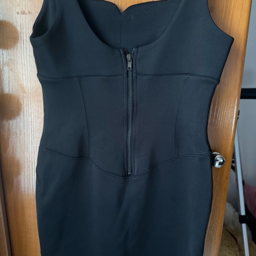 Pink Woman dress black like new, tight with nice chest cut