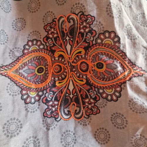 Throw from India used with hand-stitched colorful animal motifs